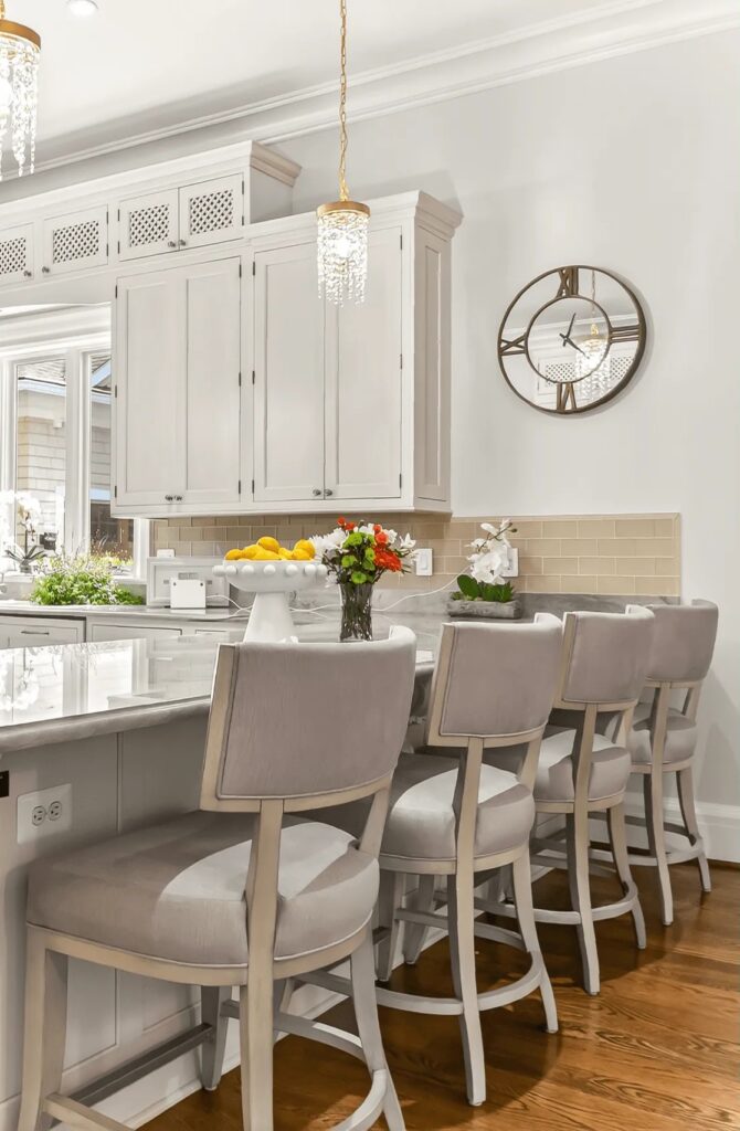 Crystal starburst chandelier over dining table with roses in McLean, Virginia kitchen