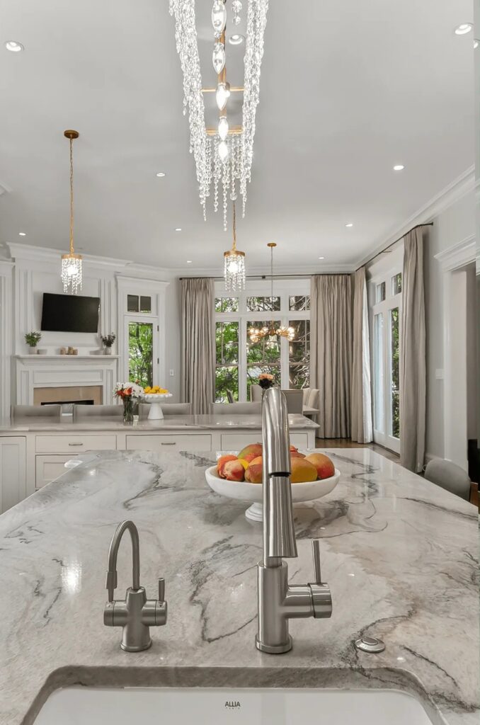 Dining table with upholstered chairs and floral arrangement in McLean, VA breakfast nook
