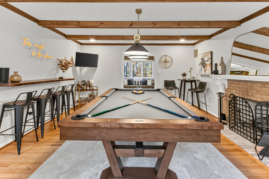 Game room with billiards table and wood beam ceiling, Northern Virginia interior design