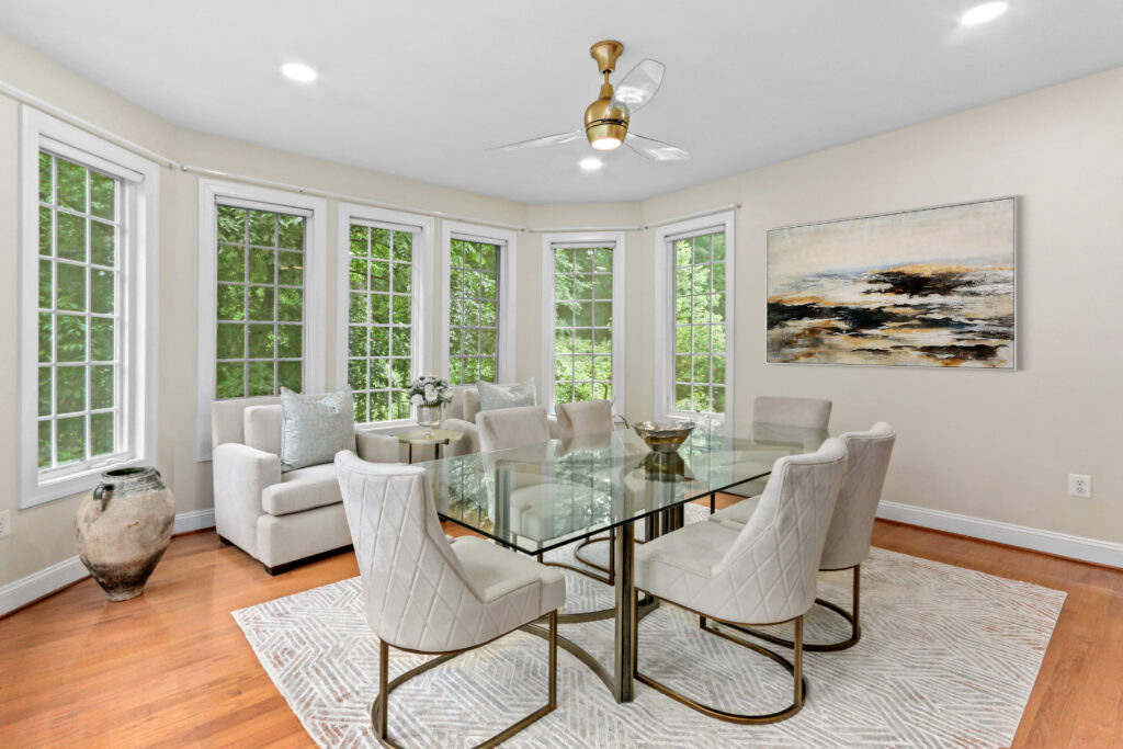 Credenza and dining area with kitchen visible in Great Falls, VA home